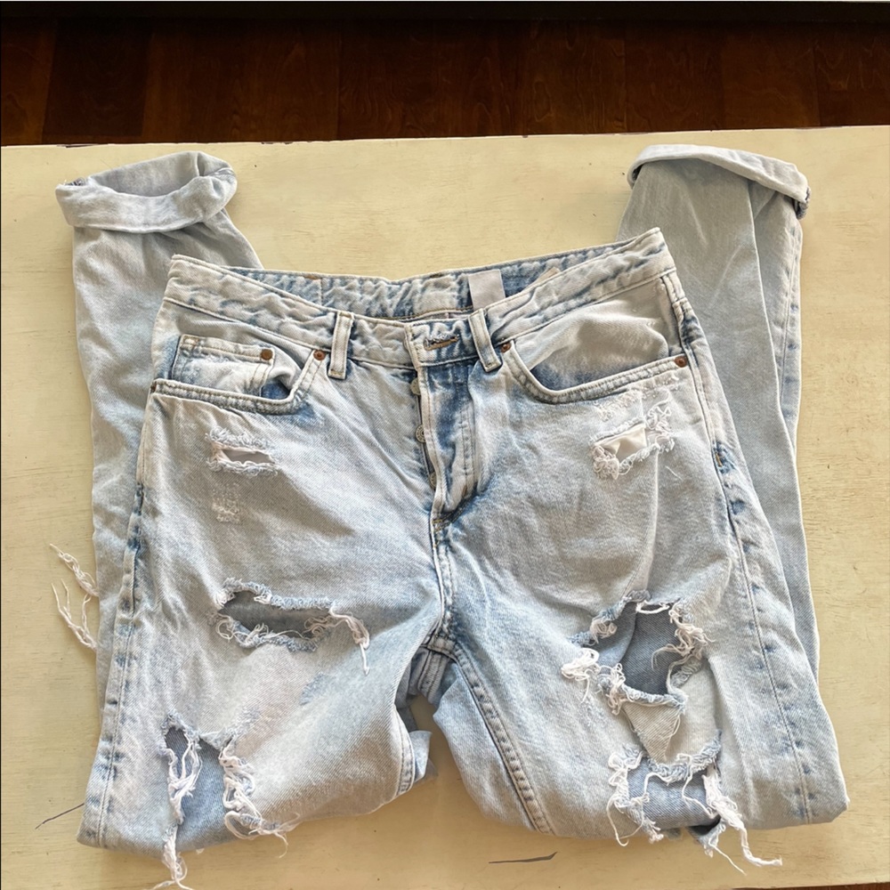 Distressed acid wash boyfriend jeans